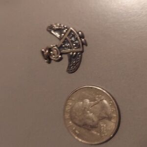 Sterling silver Anna Nicole Smith guardian angel.